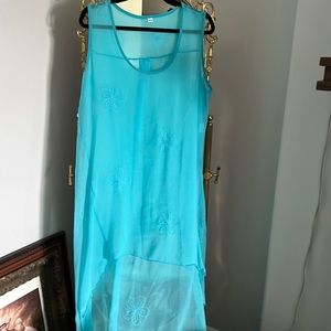 Turquoise blue sheer tunic.